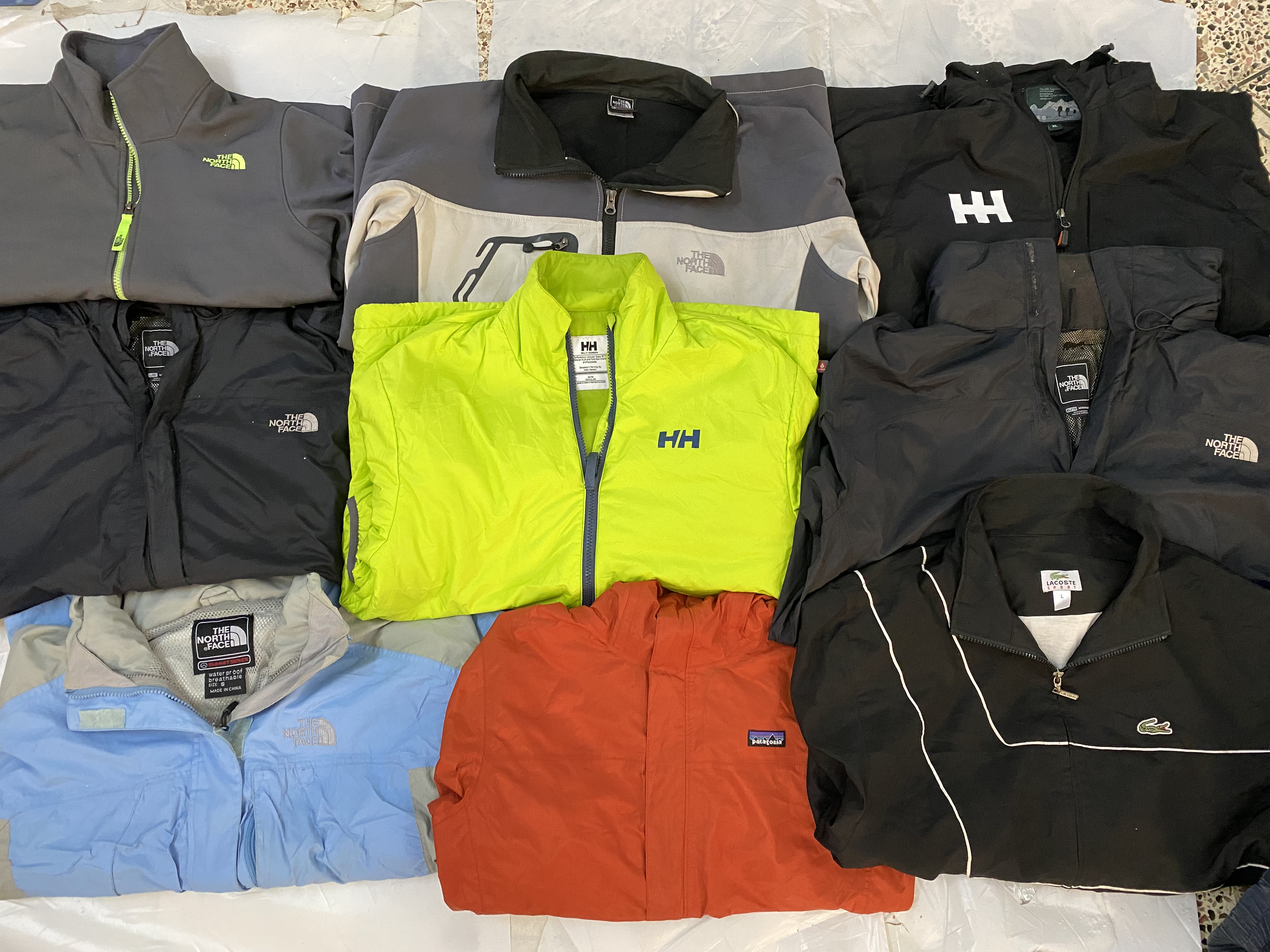 The north face/helly hansen shell/windbreaker jackets