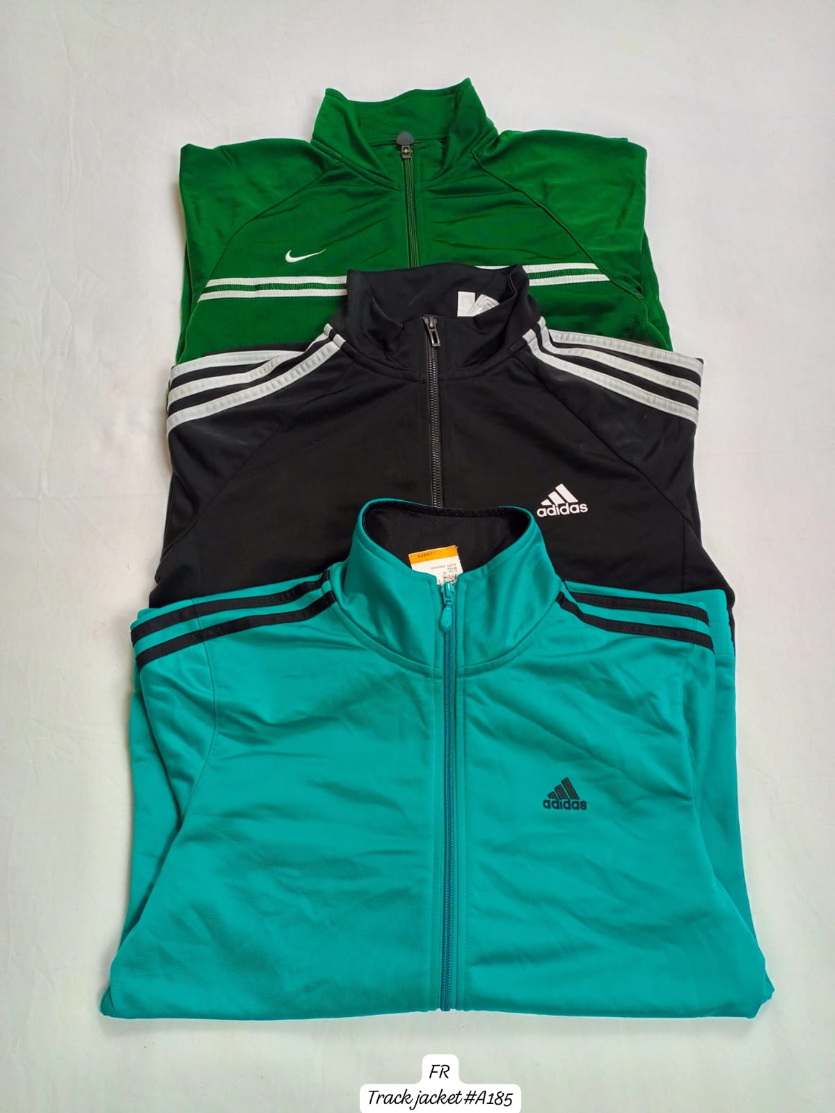 Vestes de piste Nike/Adidas