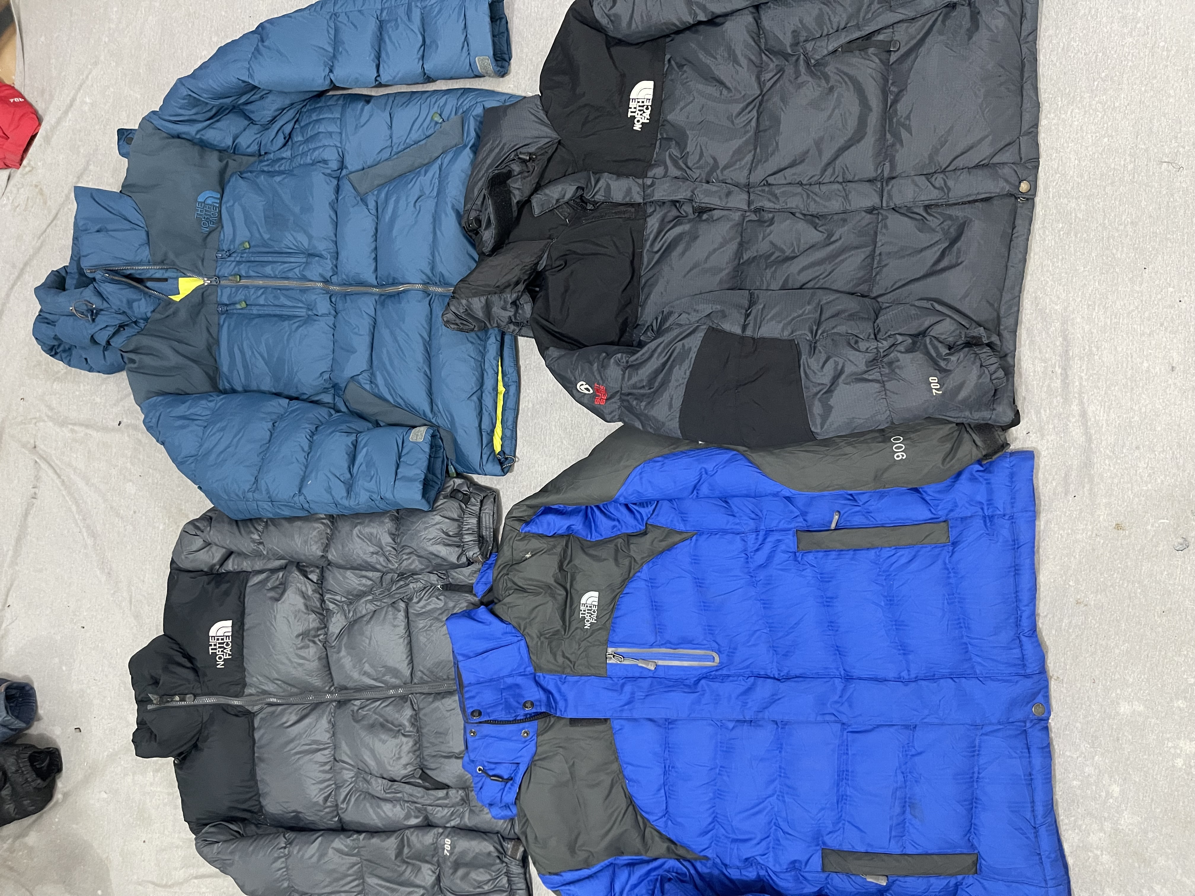 Les doudounes The North Face 7 pièces