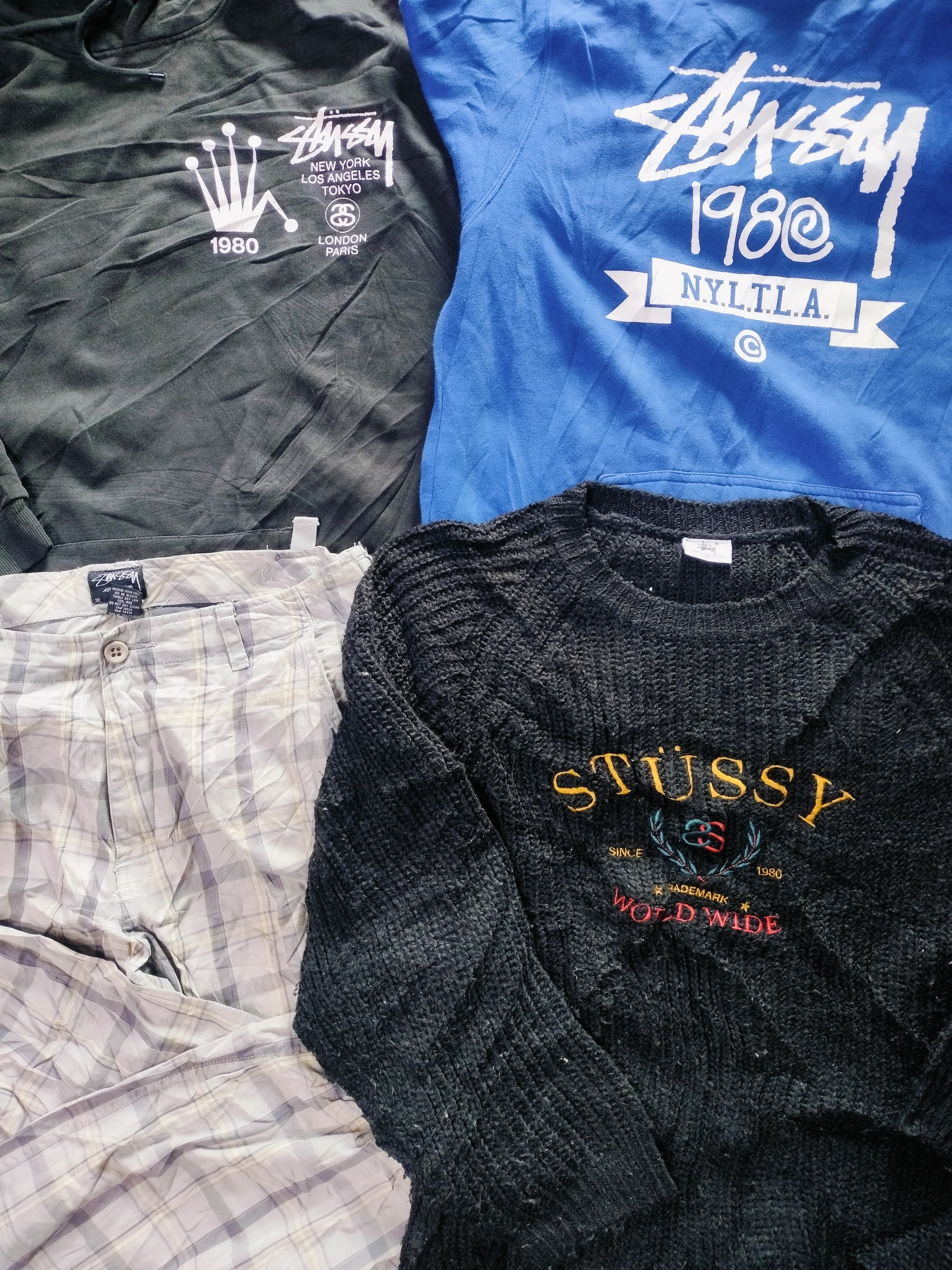 Stussy mix catégorise vestes, t-shirts, pantalons, chemises.