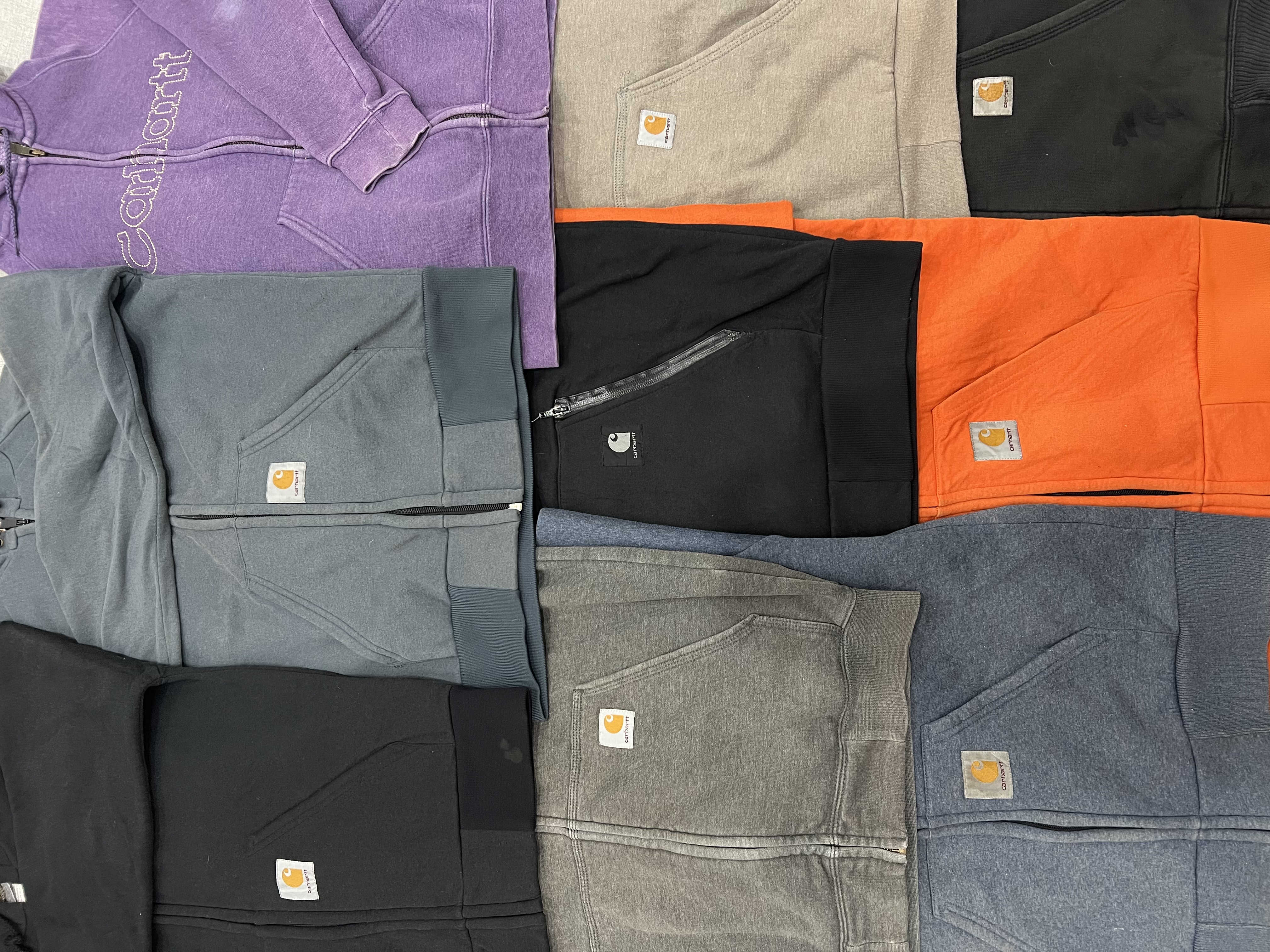 Markenartikel Carhartt Reißverschlüsse & Kapuzenpullover - 12 Stück