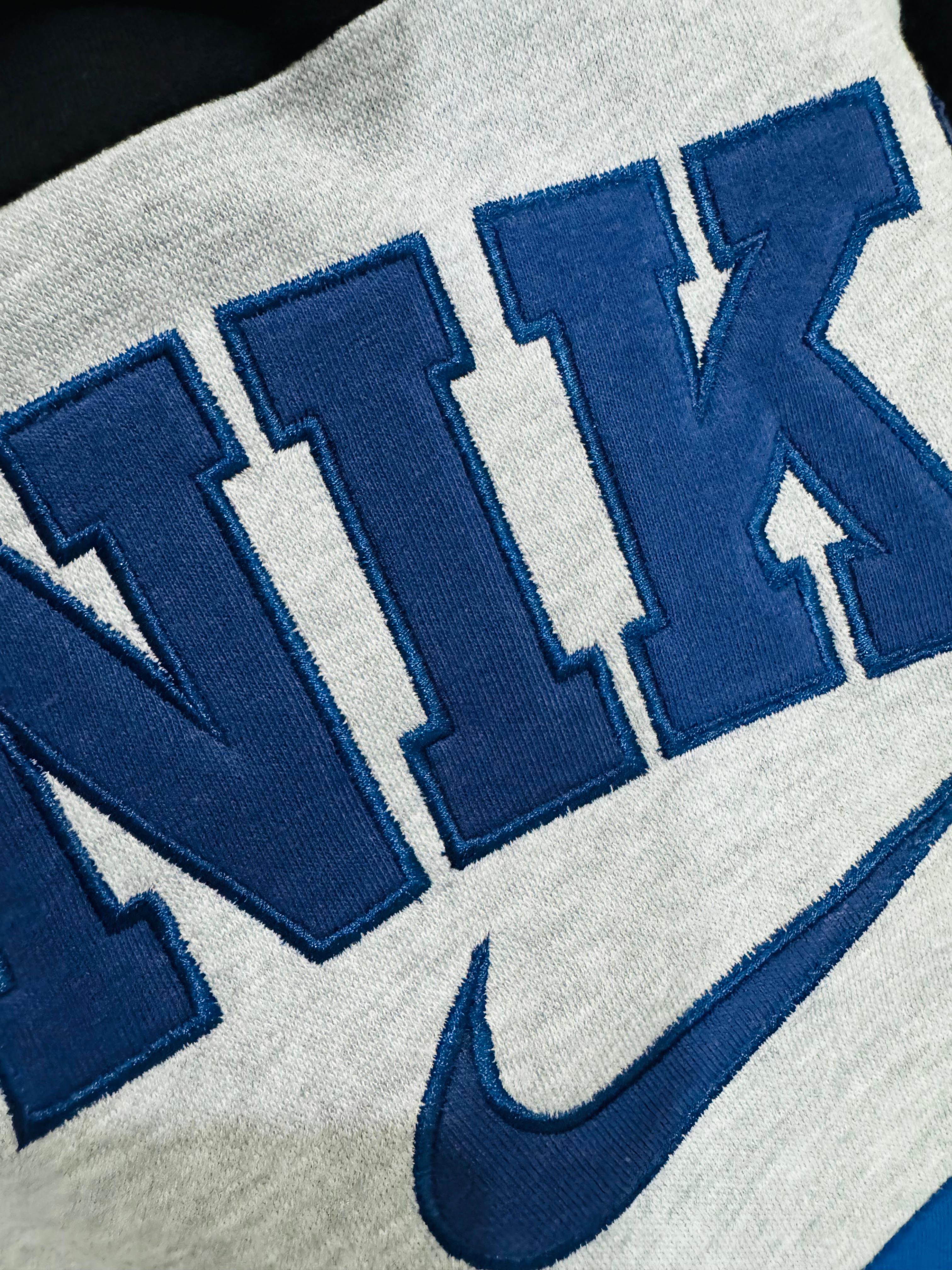 リワークスタイルのNikeスウェットシャツ
