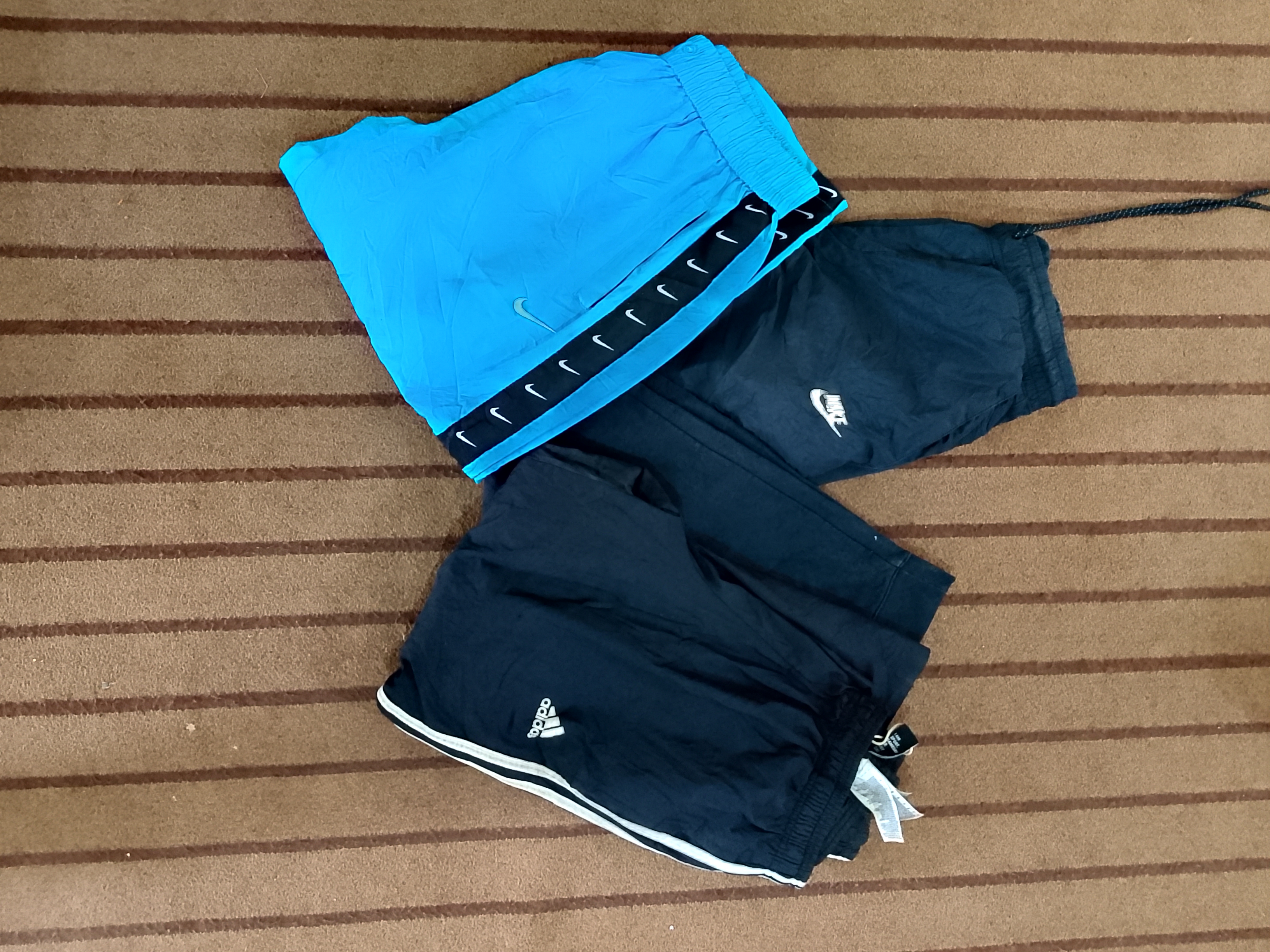 Nike and Adidas track pants