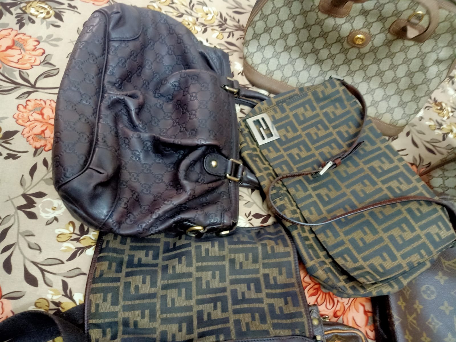Louis Vuitton, sacs à main Gucci