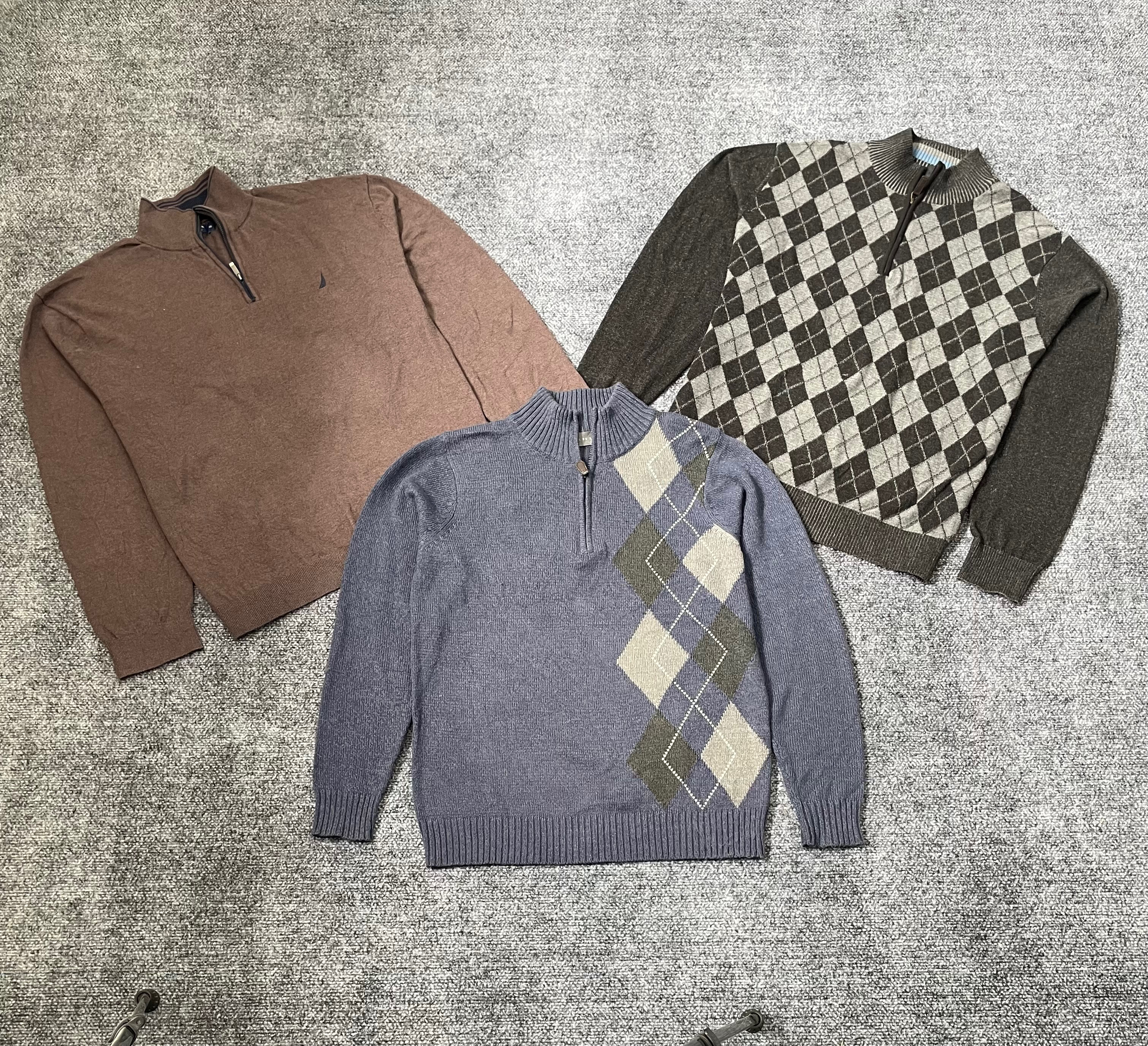 Pulls avec fermeture éclair à quart de marque