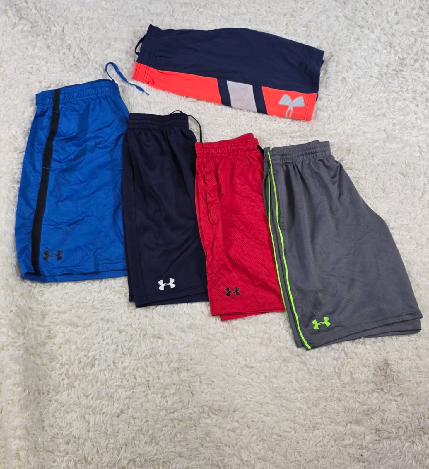 Shorts esportivos Under Armour