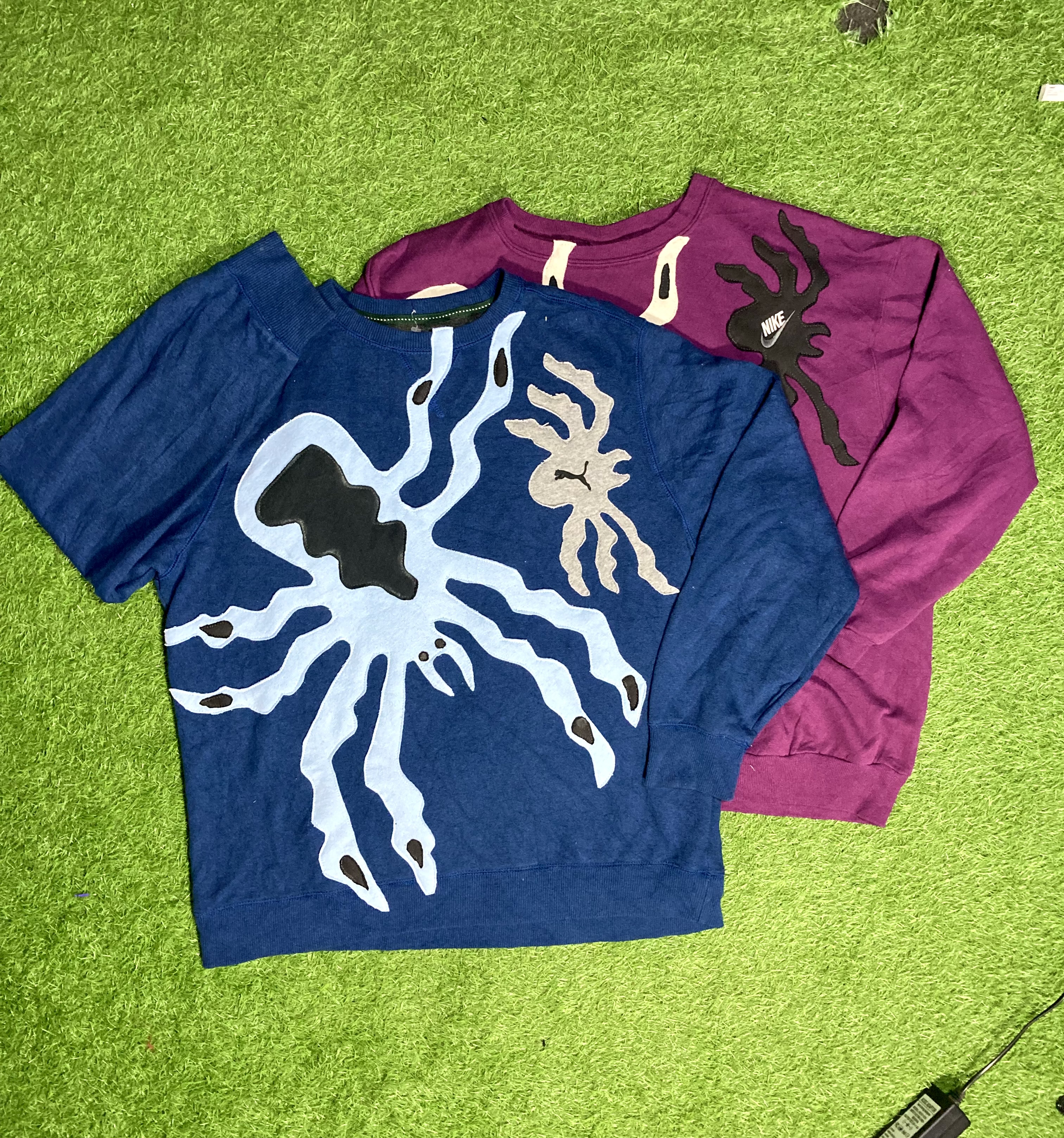 アップサイクルされたスパイダーブランドのスウェットシャツ