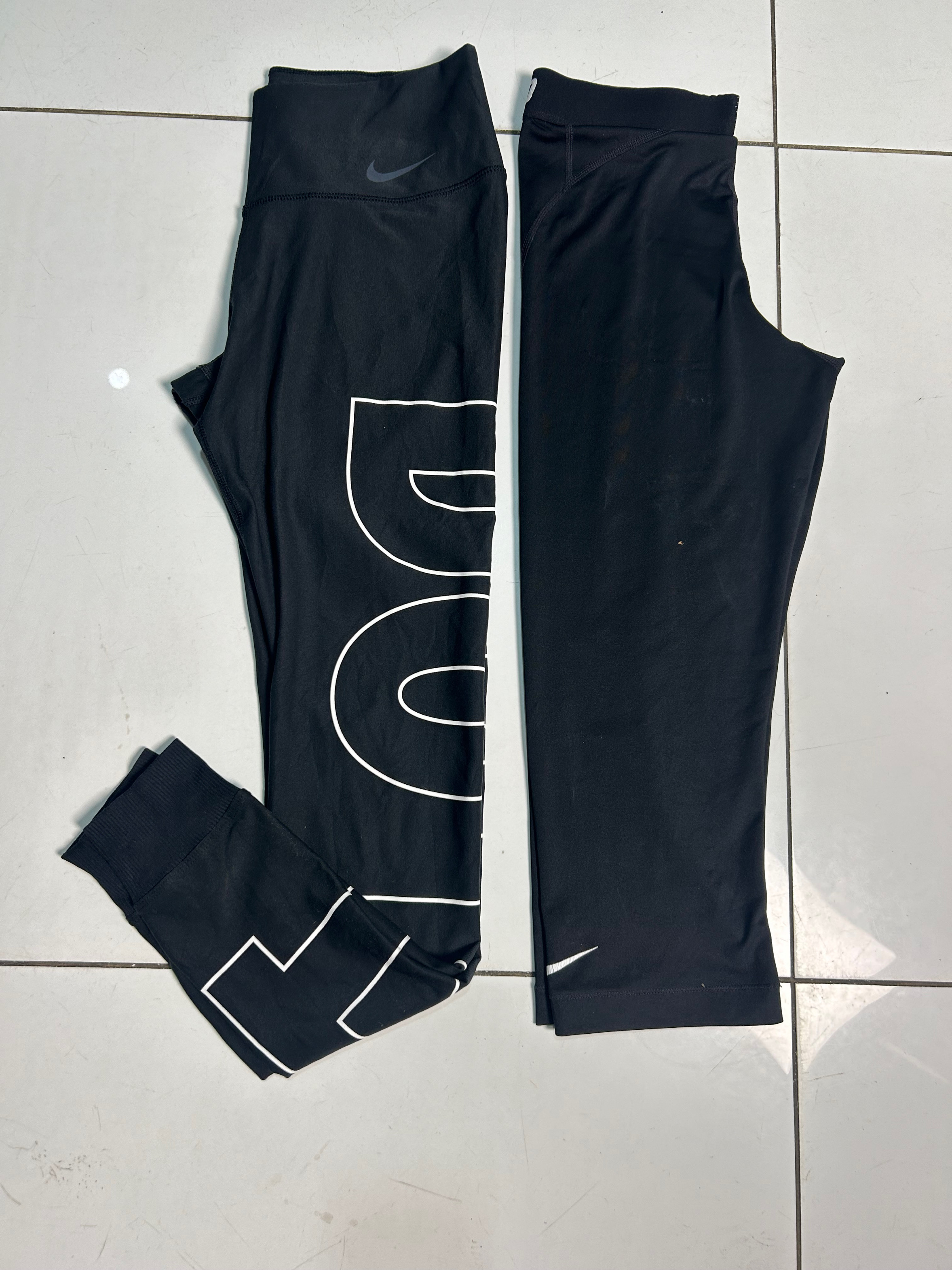 Calças de corrida Nike Ladies WR-0051