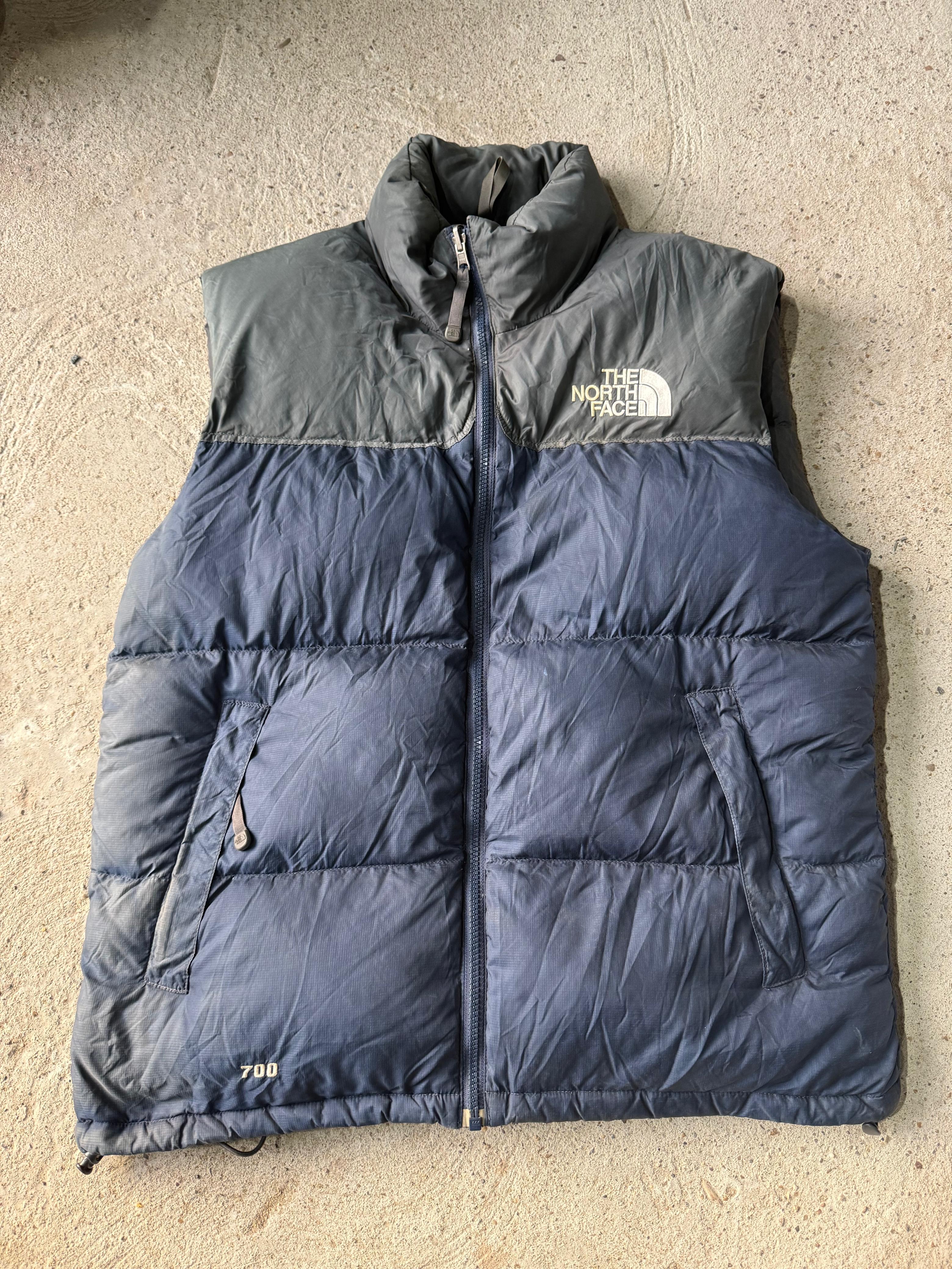 The North Face vest puffers