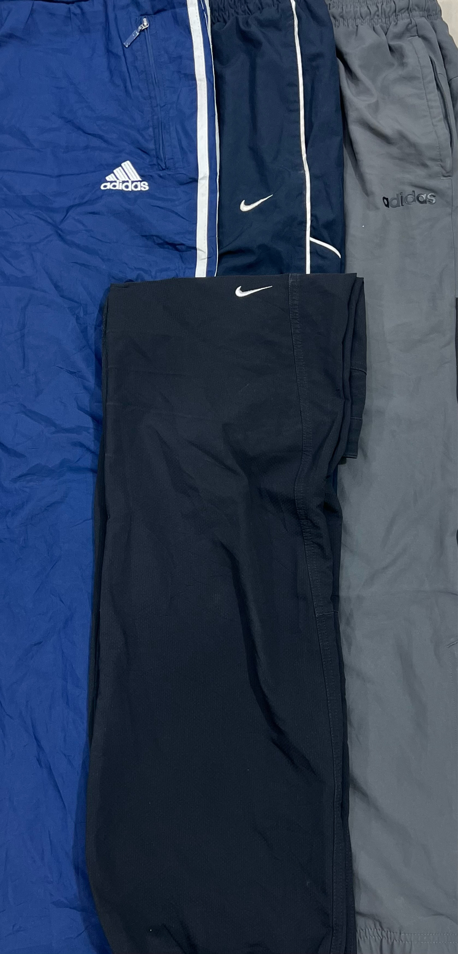 mixed branded track pants