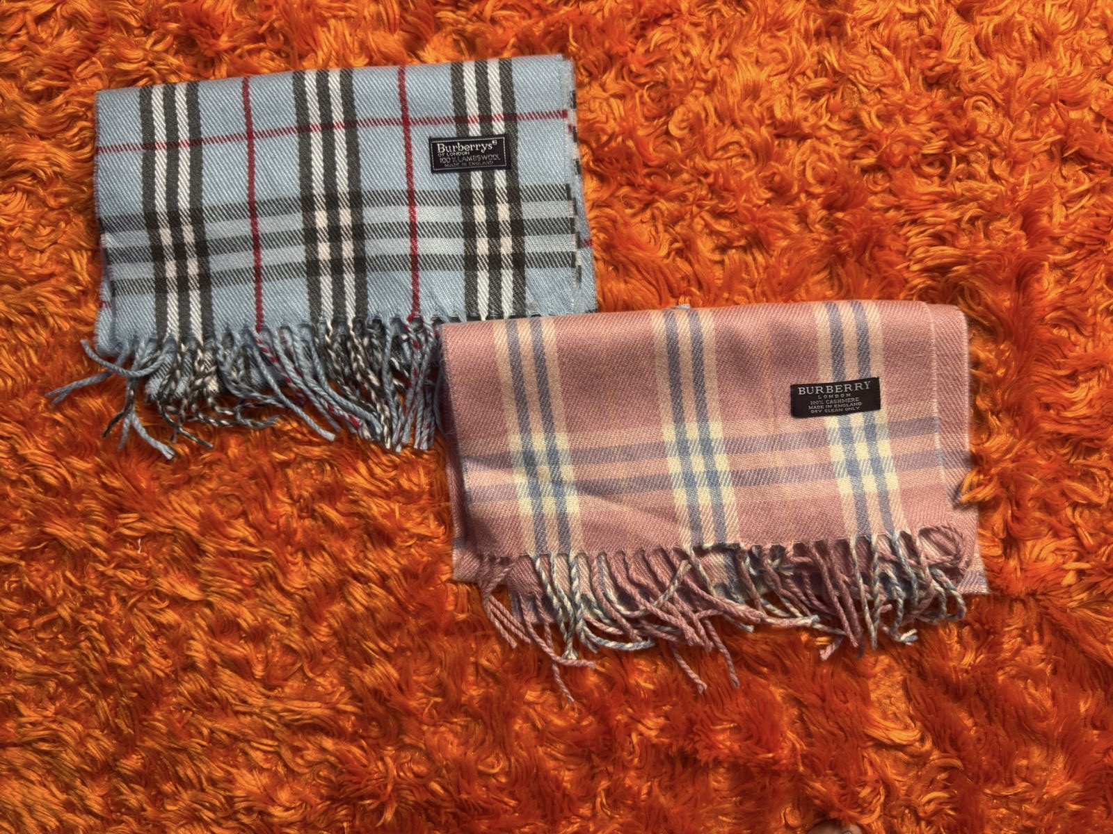 Pink and sky blue Burberry scarves