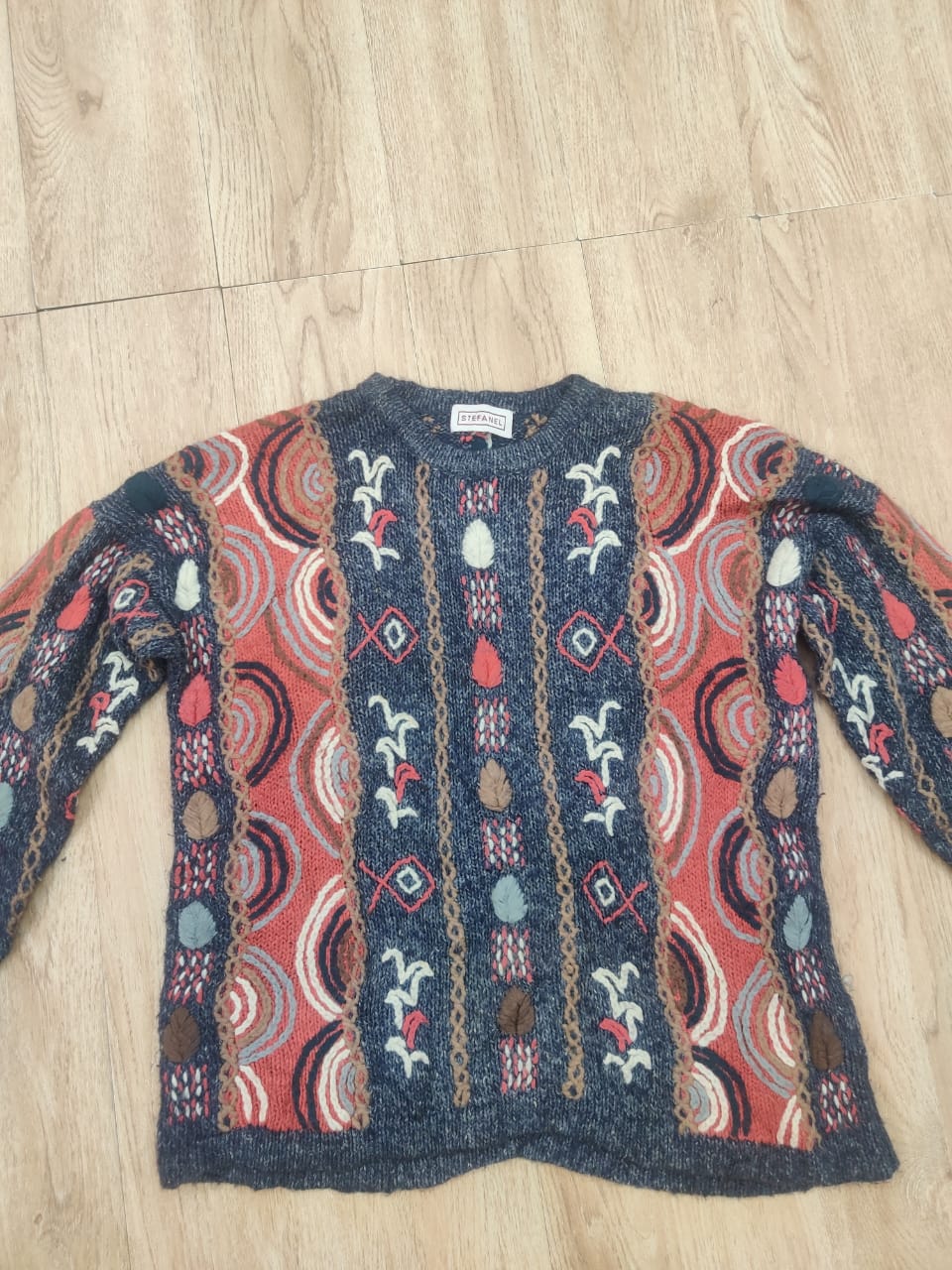 クージースタイルのセーター