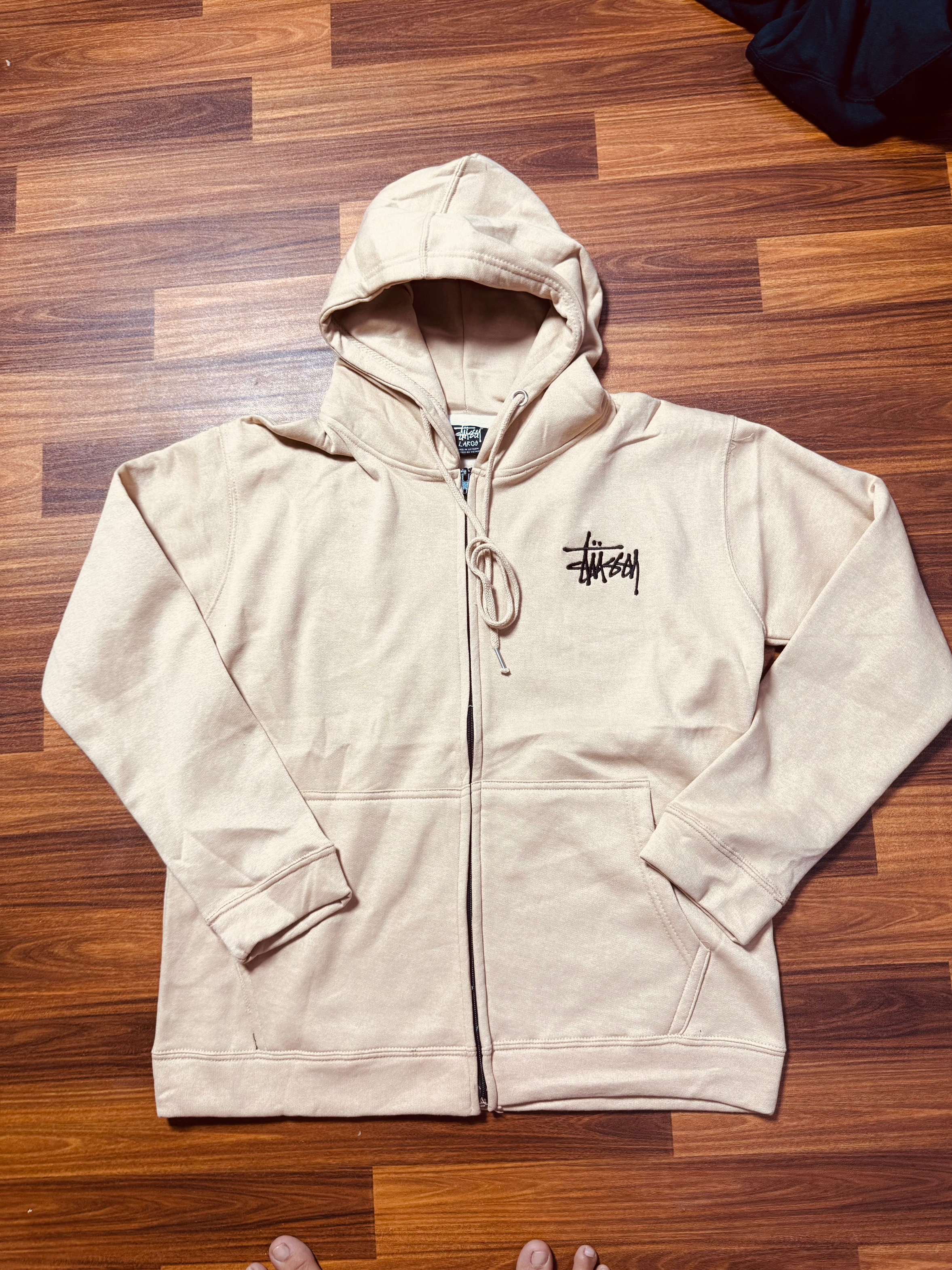 Stussy réinvente le style de hoodie zippé de toutes les couleurs