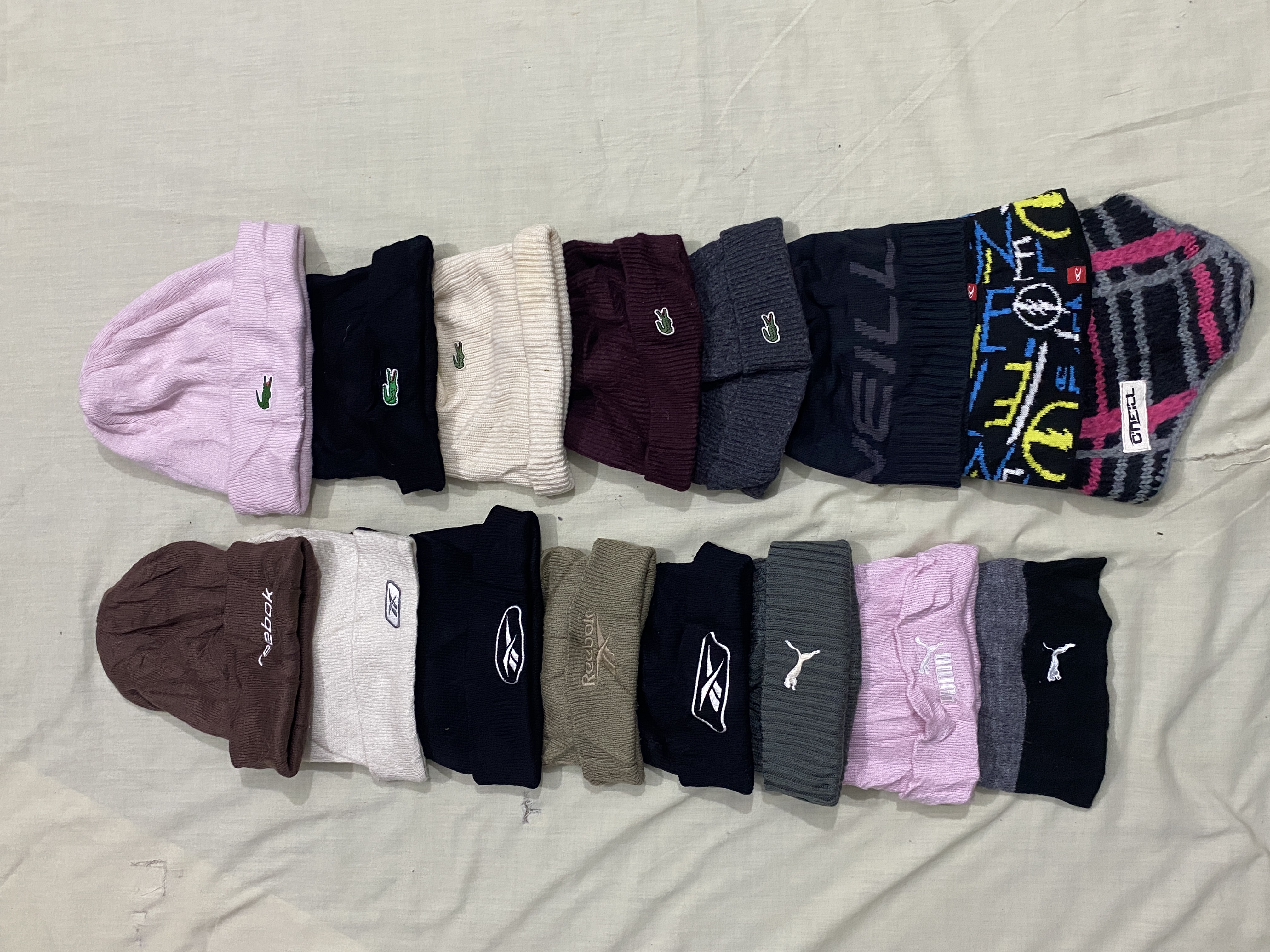 Rebook, Lacoste,puma & oneill beanies 16 pcs