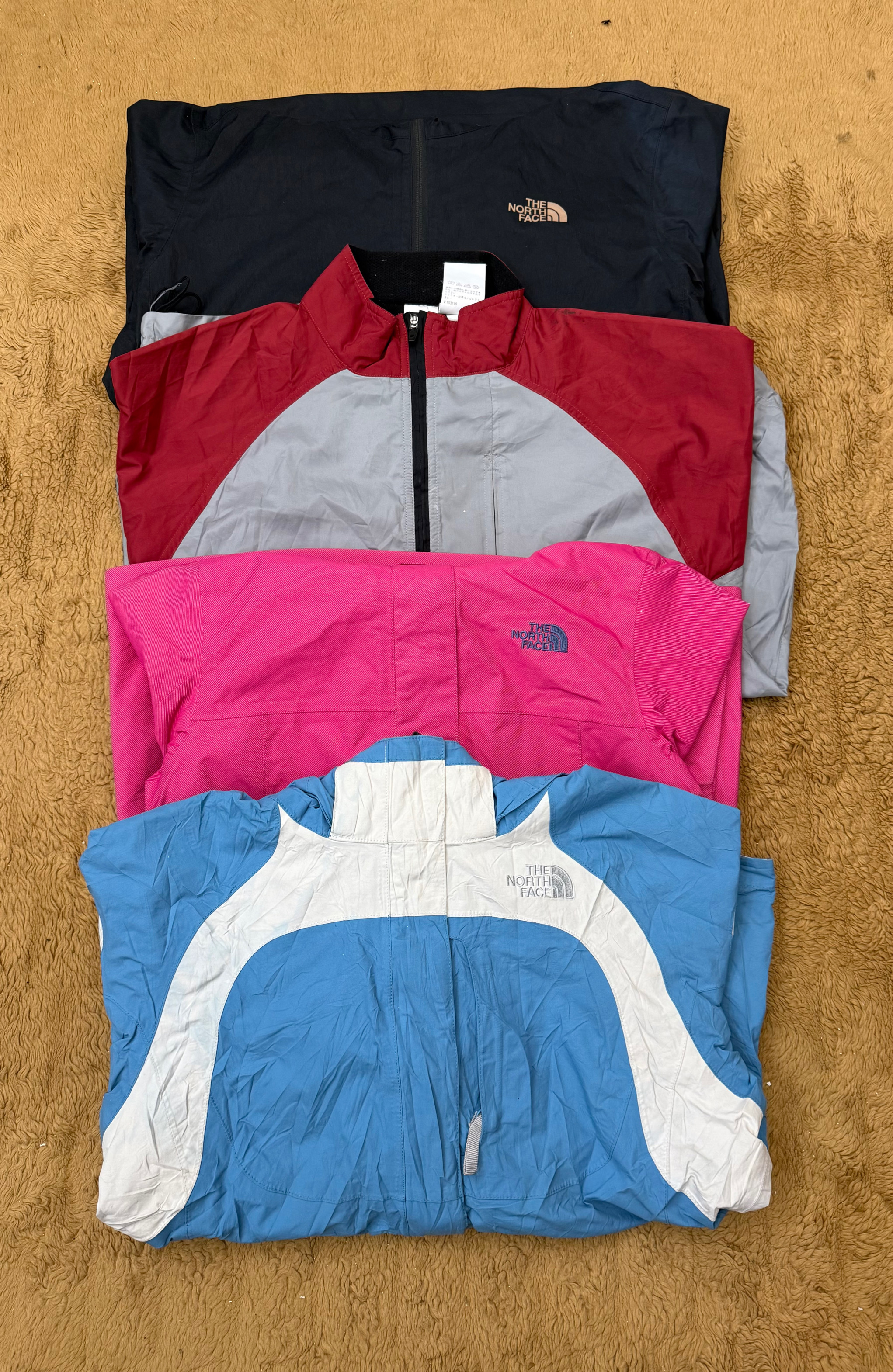 The North Face Windbreakers