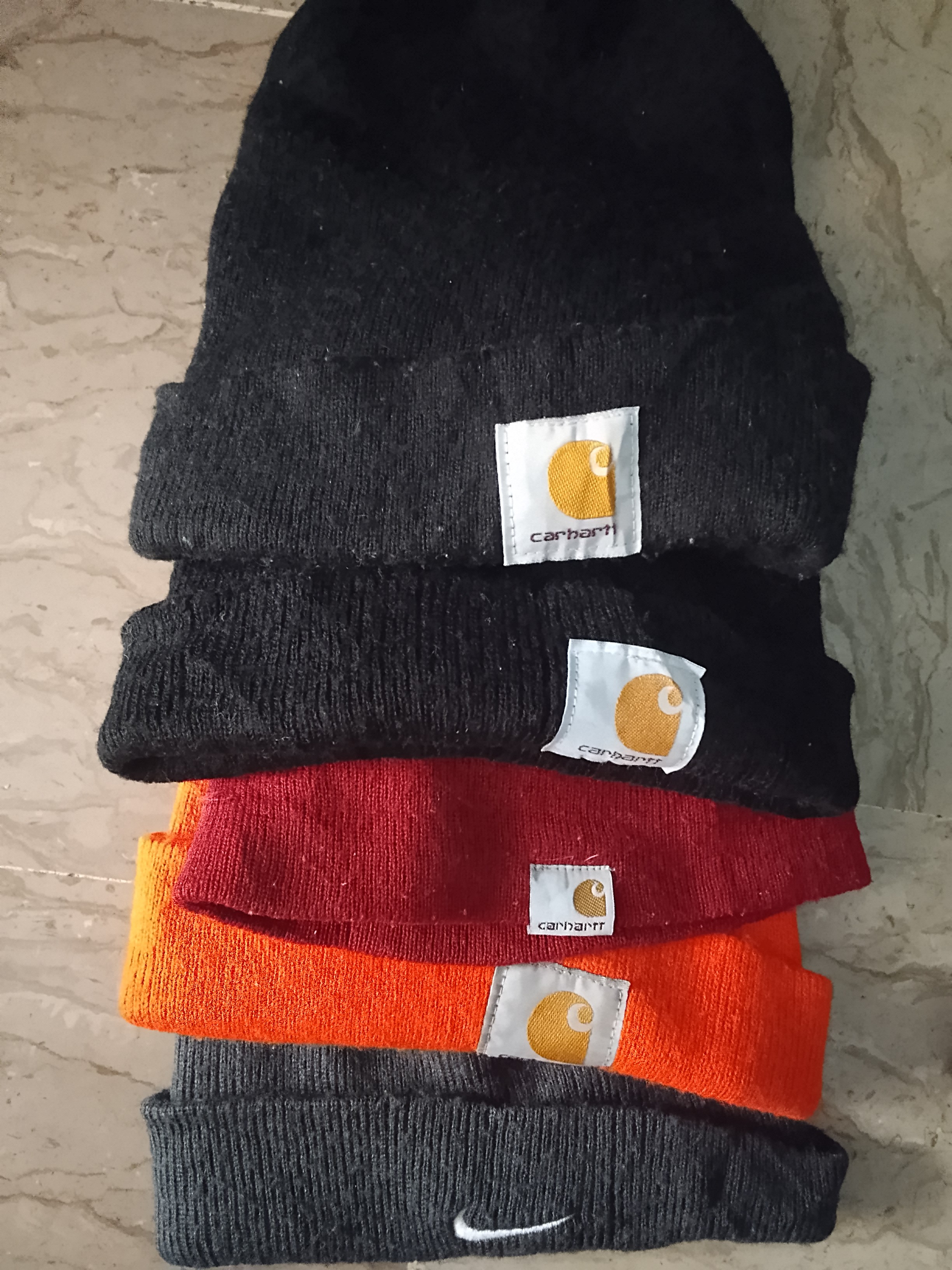 Carhartt polo and Nike beanies