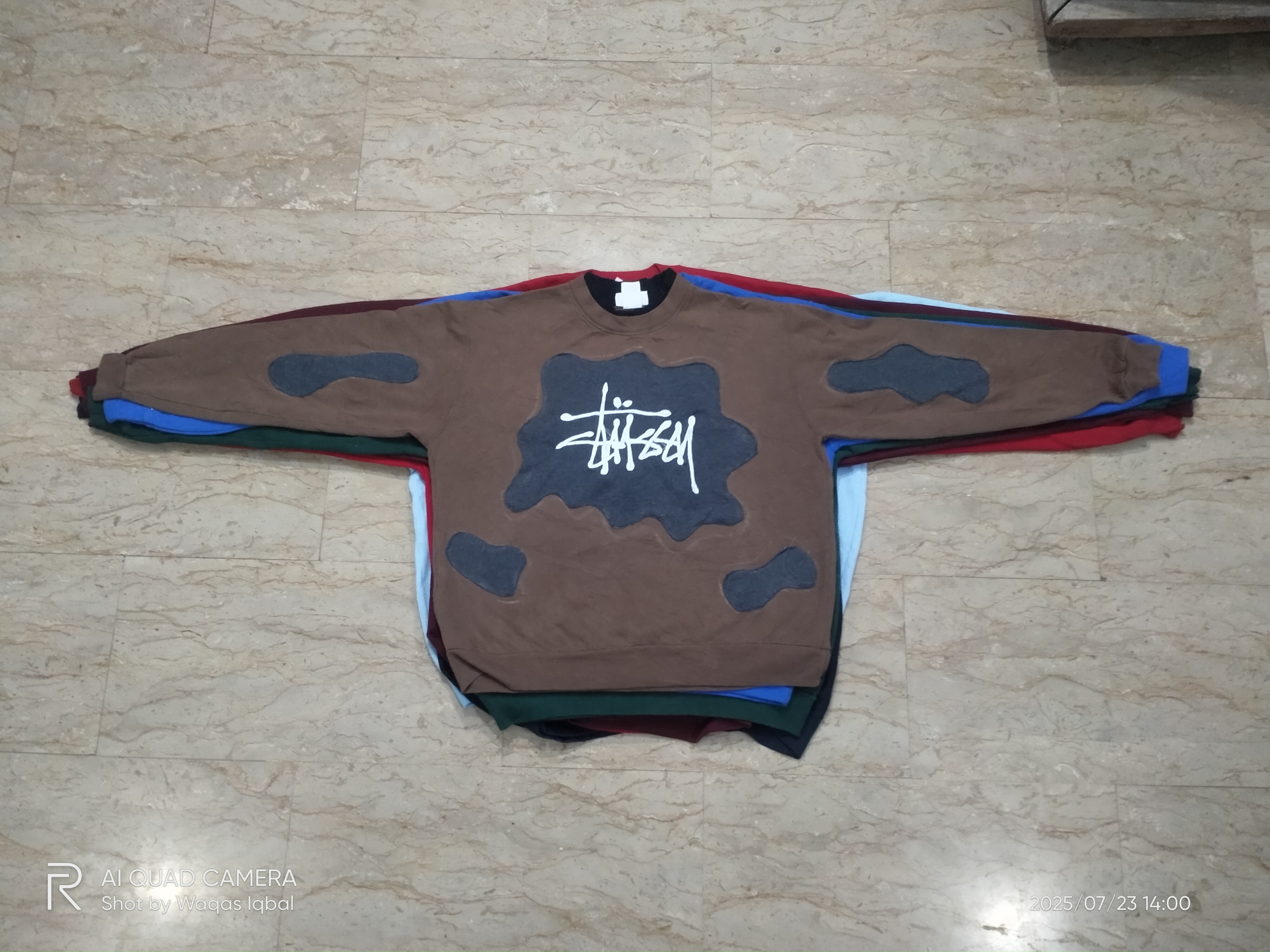 Upcycled patch work branded sweatshirts