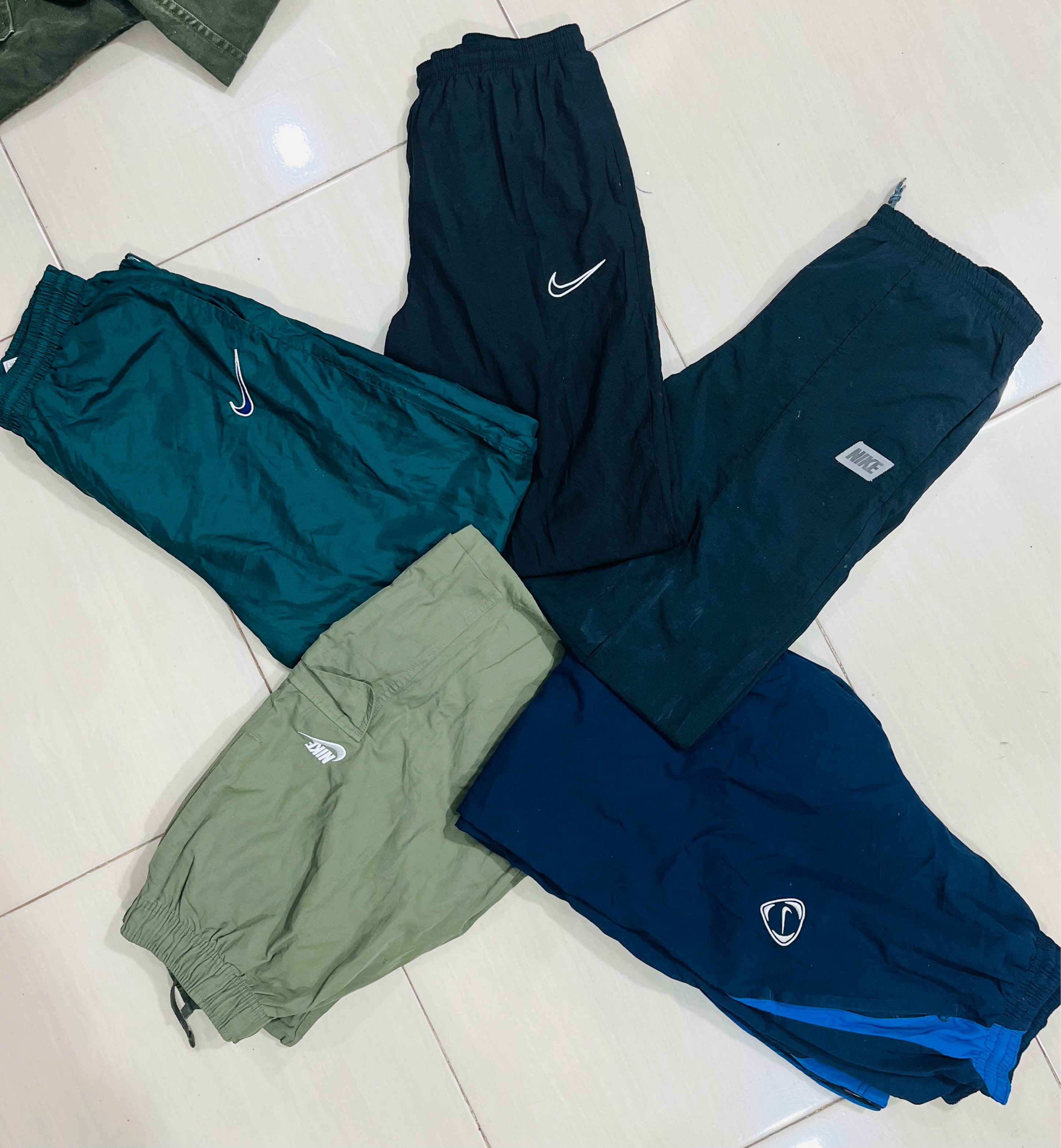 mixed nike track pants
