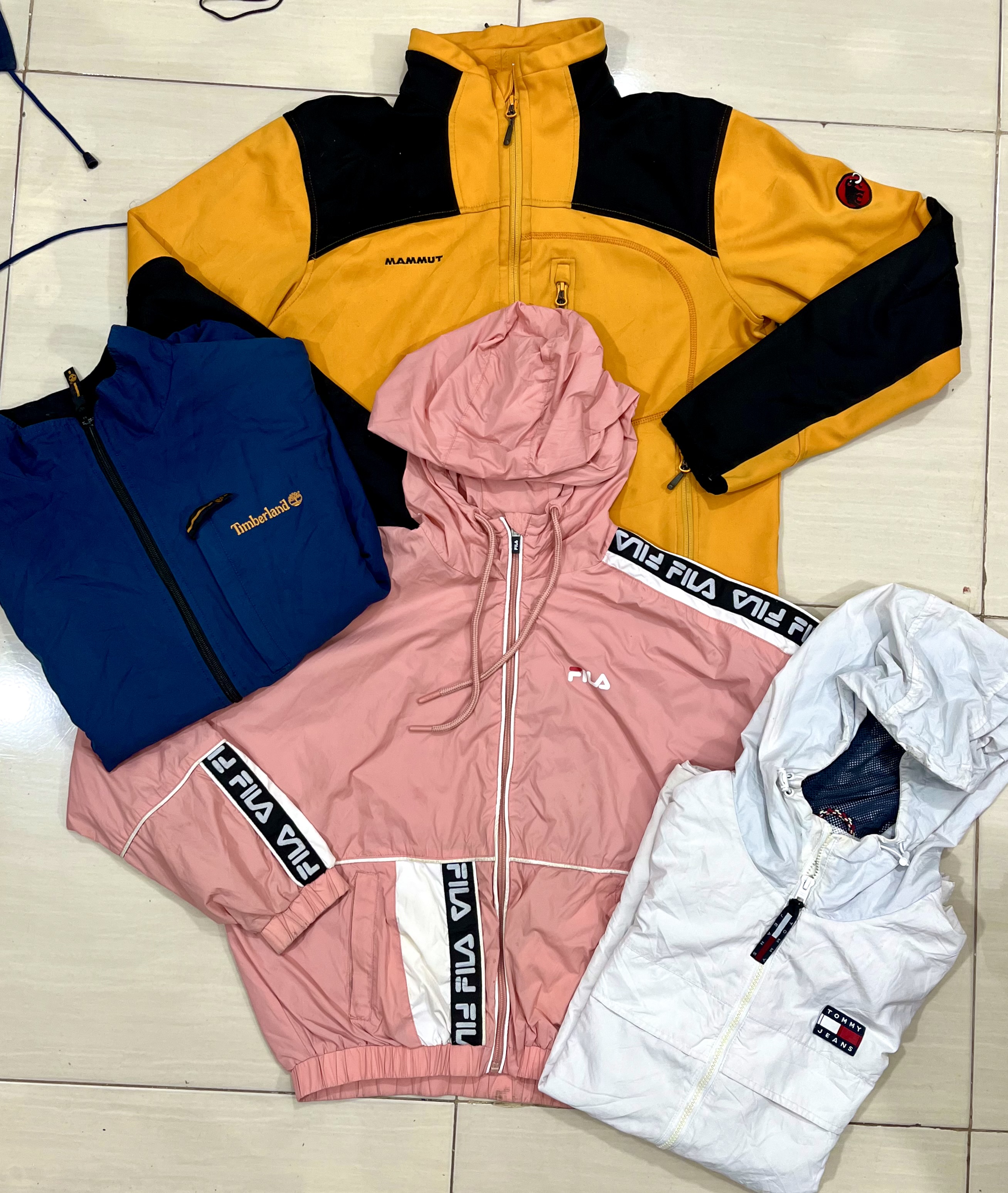 Giubbotti a track misti con marchio