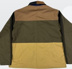 Revoir le style des vestes patchwork Carhartt Detr..