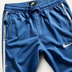 Nike Fallschirm Laufhosen 30 Stück