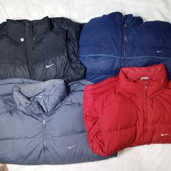 Nike Daunenjacke & Weste