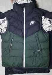Nike Daunenjacken und -westen
