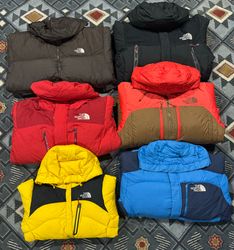 As jaquetas puffers Nuptse da The North Face 700 /..