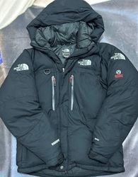 A jaqueta puffer The North Face pcs 25