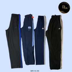 Y2K Adidas & Nike Trousers: Classic Athletic Style..