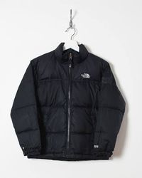 Les doudounes The North Face.