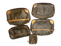 five pieces of Louis Vuitton bags