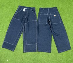 Pantaloni in denim azzurro baggy carhartt in stile..