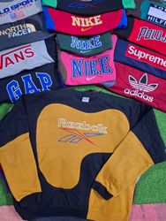 Rework Style Reebok sweatshirt.