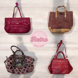 Hermosas bolsas coach rojas.