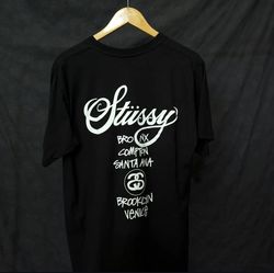 Stussy Rework Style Weltreise Schwarzes T-Shirt 20..