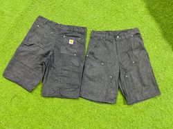 shorts de jeans cinza escuro com joelhos duplos es..