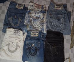 TRUE RELIGION HOMMES PORTENT DES SHORTS (10 pièces..