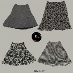Trendy Y2K Printed Black Poly Skirt – Bold 2000s F..