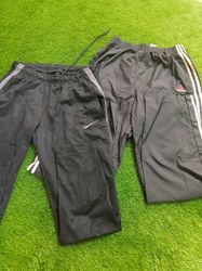 Mixed Nike and adidas track pants