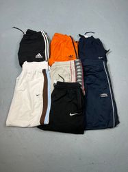 Calças de treino Nike e Adidas