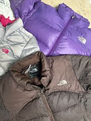 Die North Face Puffers
