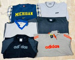 Mélange de vêtements de sport vintage en..