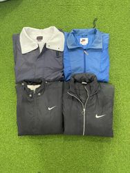NIKE | CHAQUETAS PARACAIDISTAS | 297