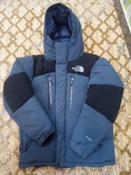 Les doudounes The North Face.