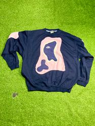 Pulls en patchwork Nike revalorisés