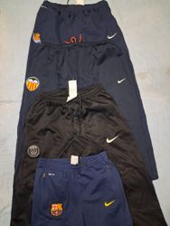 Nike and Adidas track pants