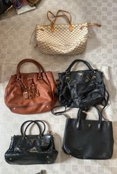 Bolsos de Prada y LV