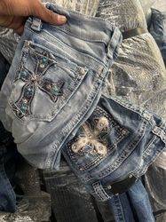 女性用刺繍フレアジーンズ