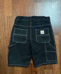 Shorts noirs Carhartt Rework Style avec couture bl..